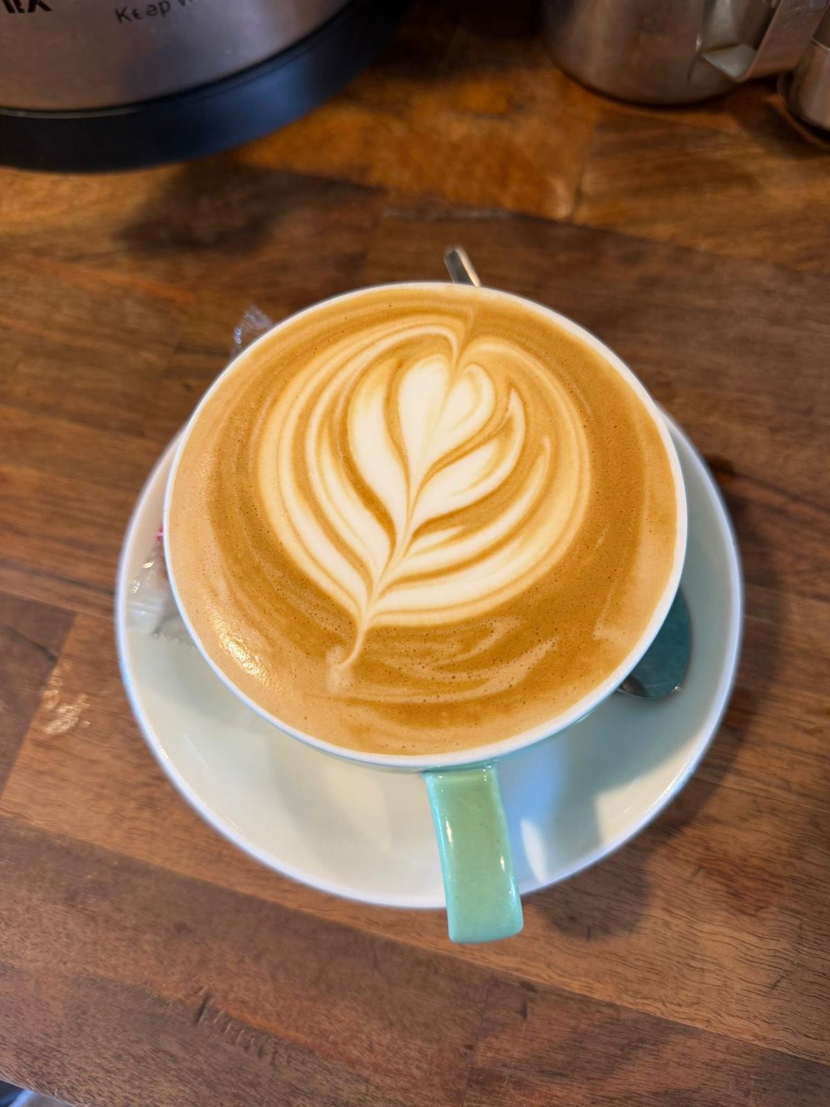 Freshly made coffee with latte art