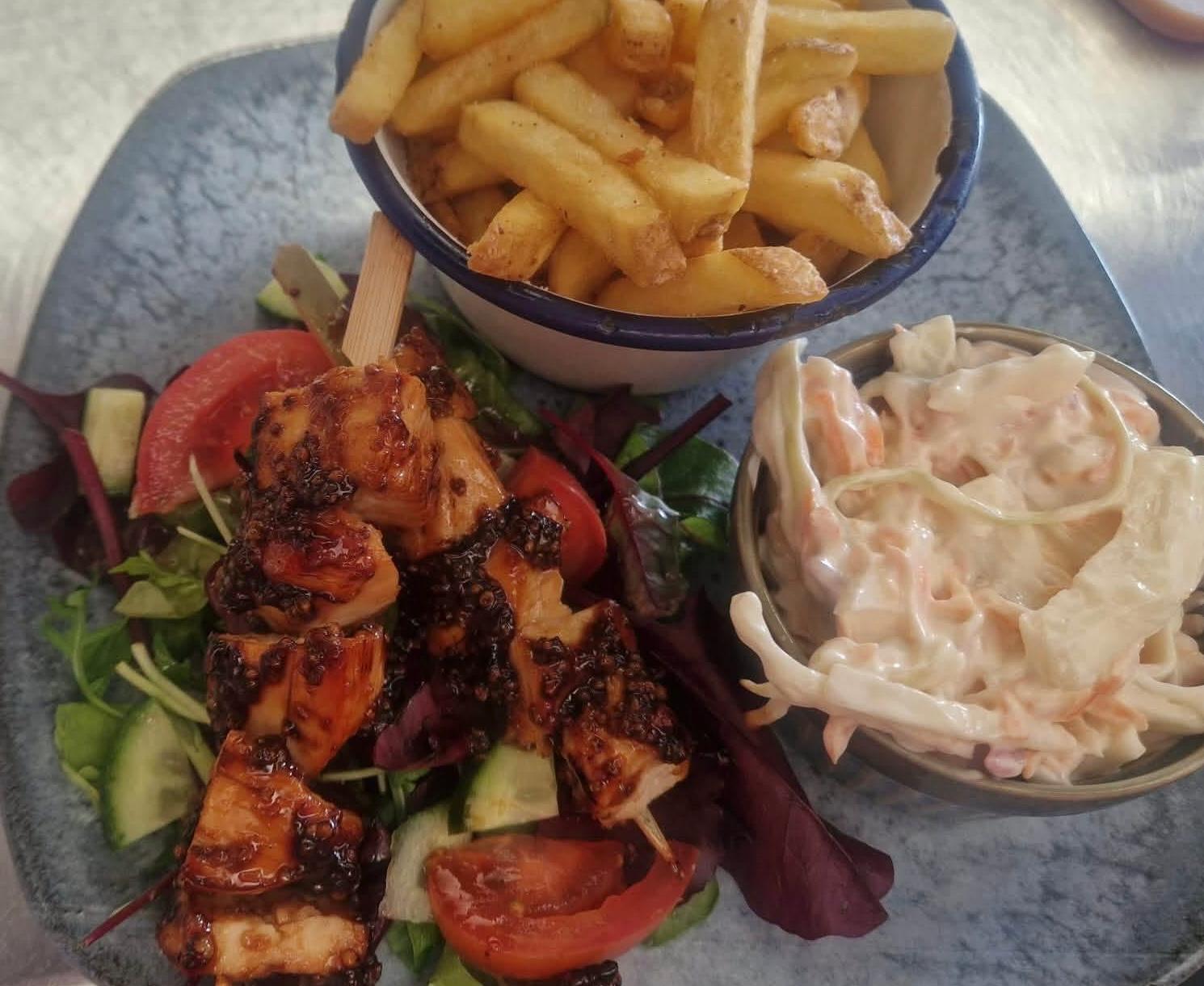 Burgers served with chips and salad
