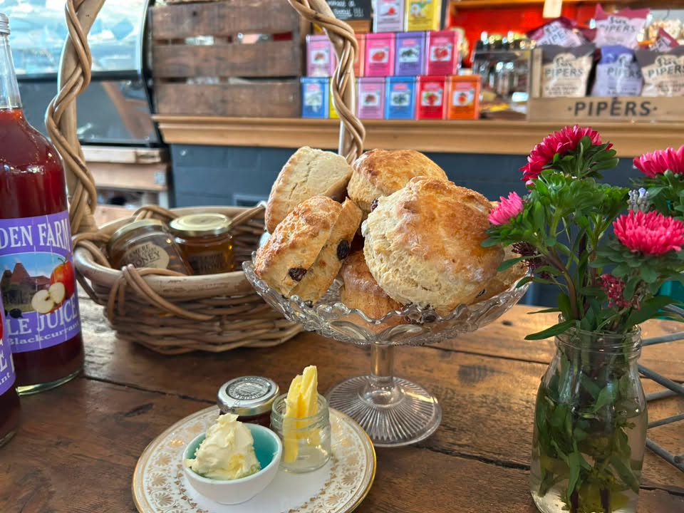 Scones, jam, and cream on the shop counter